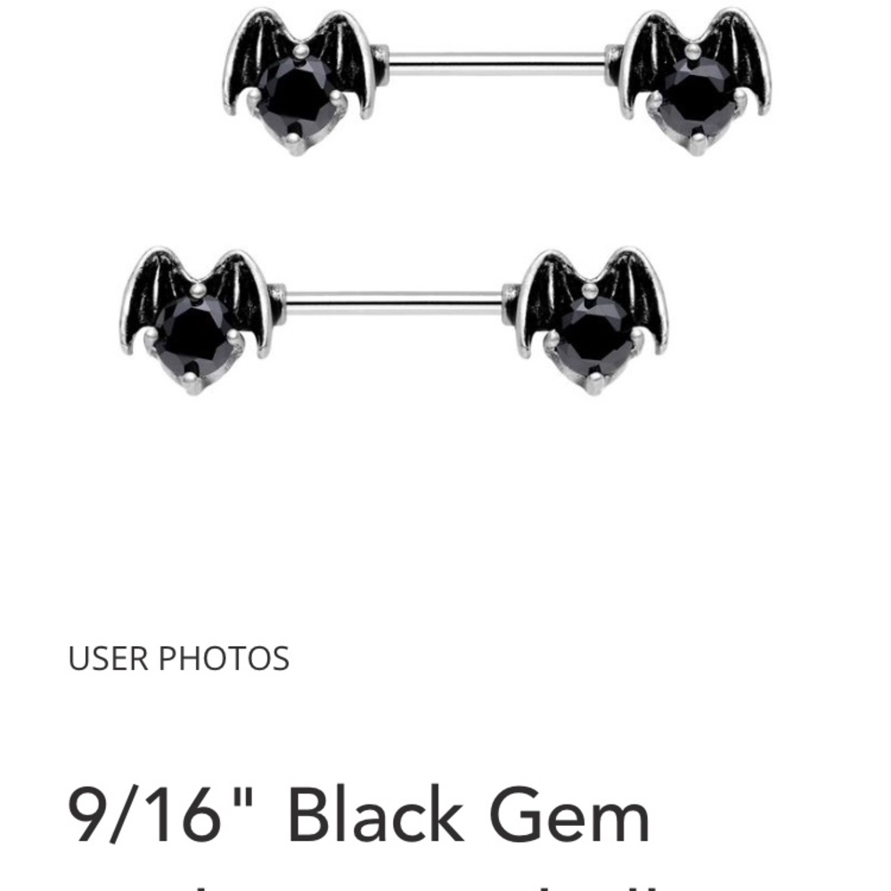 9/16’ black gem bar nipple ring.